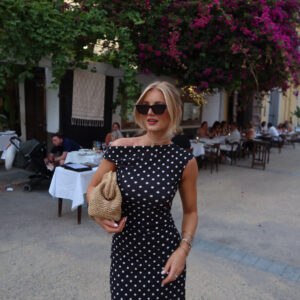 Top asymétrique noir à pois
